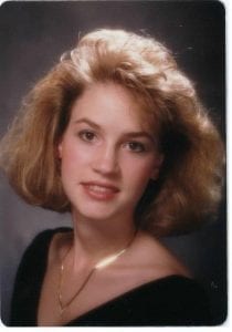 A woman with blonde hair - Kimberly Lowe high school photograph