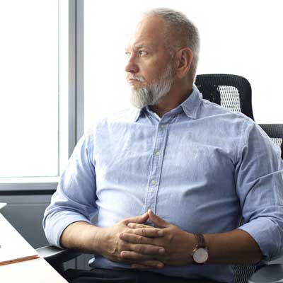 A man sitting at a desk - Choosing the right transition strategy